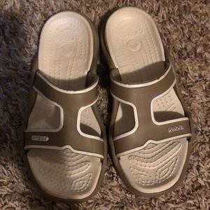 Tan and white Croc sandals